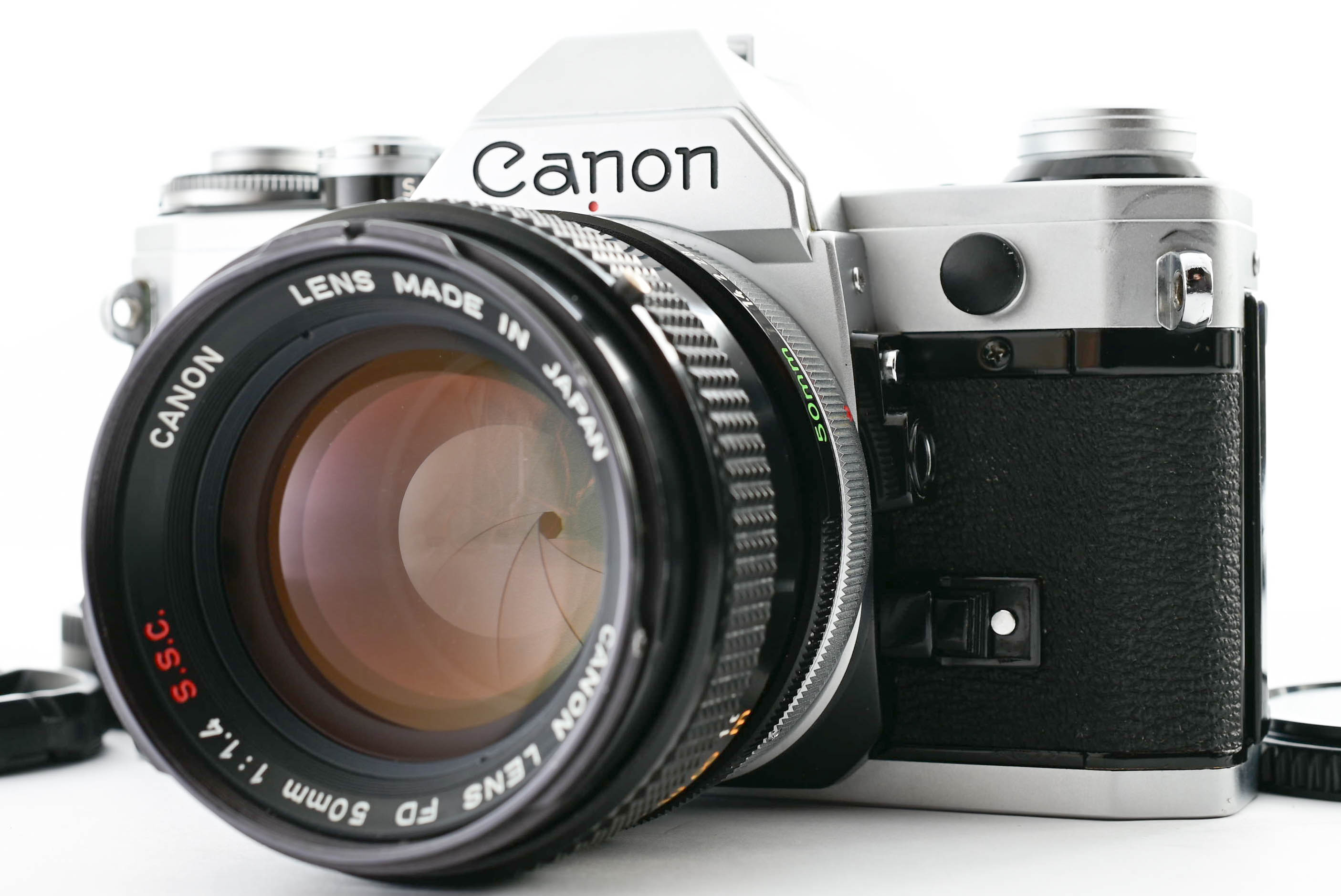 Canon AE-1 camera body with FD 50mm f/1.4 S.S.C. lens - Image 1